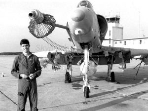 Blade standing beside a VMA-131 A-4E fitted with the basket
