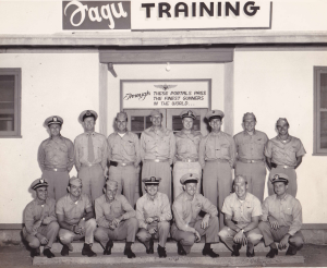 captain-slim-russell-usn-4thfromright-backrow_ron-russell.png